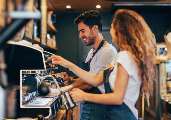 Skilled baristas crafting delicious coffee, a common sight in the thriving hospitality industry in Australia insured against unforeseen incidents